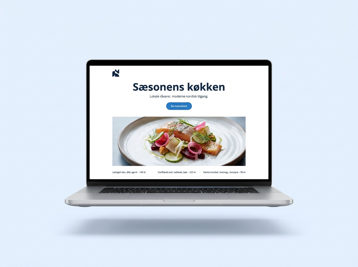 En færdig, live hjemmeside vist på laptop